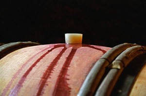 Red wine in an oak barrel