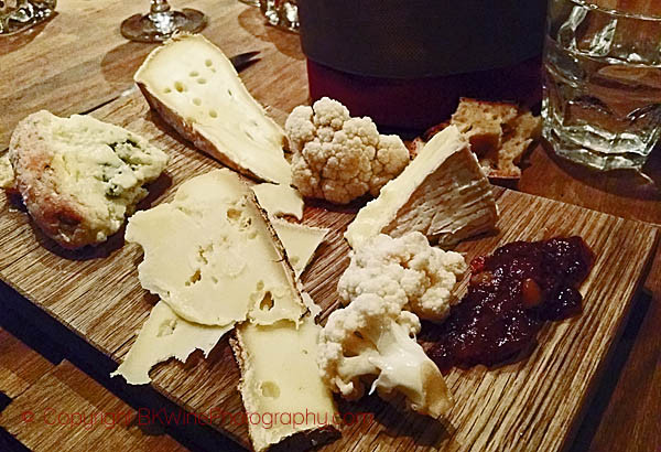 A cheese platter in a Paris wine bar