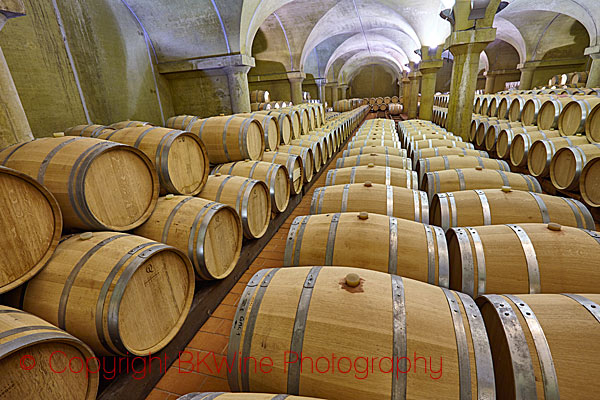 Wine cellar with barrels in Piedmont