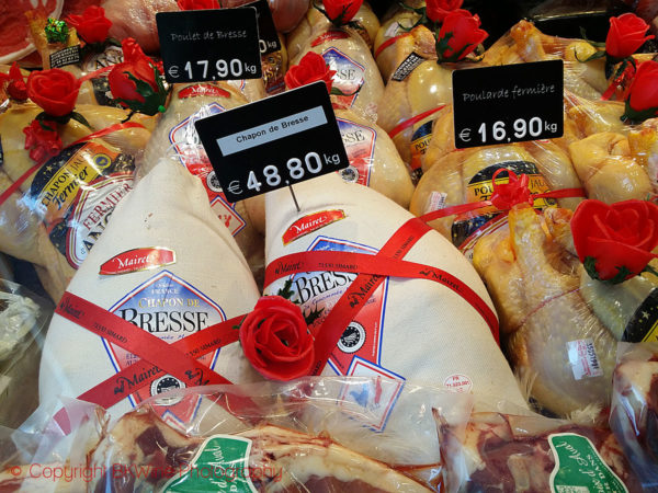 Capon at a market in Paris