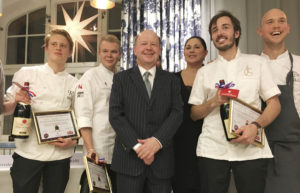 The competitors at the prize ceremony with the French ambassador