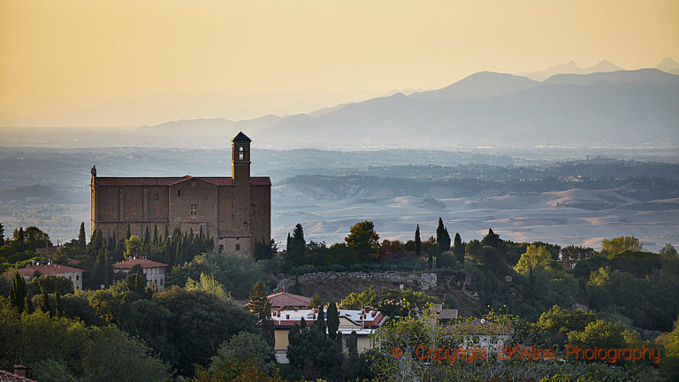 A view over the landscape in Tuscany with a church