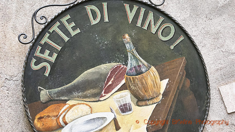 A sign for a restaurant in Tuscany