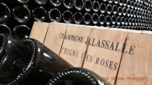 Bottles in the cellar of Champagne J Lassalle