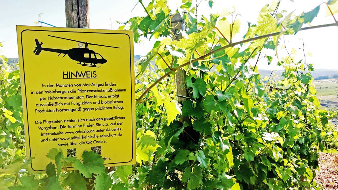 Sign notifying about helicopter spraying in Mosel