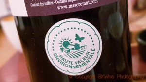 Label on a wine bottle with sign HVE, Haute Valeur Environnementale