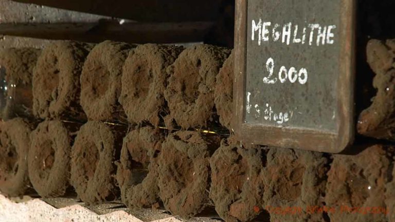 Bottles ageing in the cellar. Megalithe 2000, Domaine de la Perriere, Sancerre, Loire