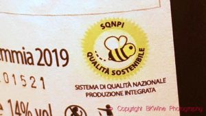 Italian sustainable branding on a wine from Tenute Olbios, SQNPI Qualita Sostenibile