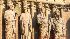Four religious statues on the cathedral in Reims