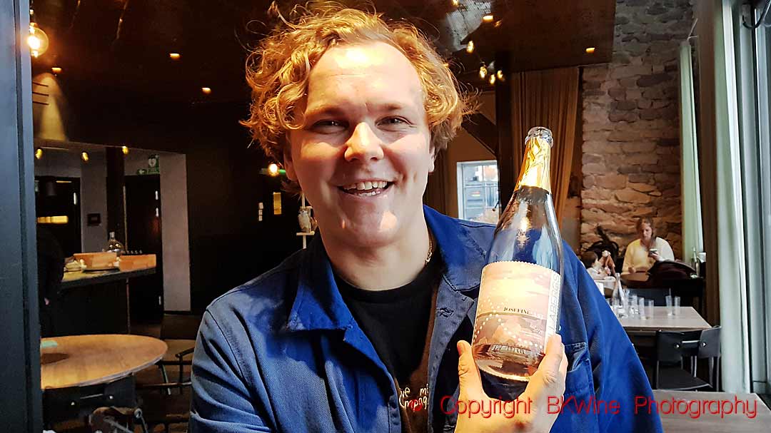 The waiter (sommelier) at Spritmuseum, Stockholm with a bottle Josefinelust, Kullabergs Vingård